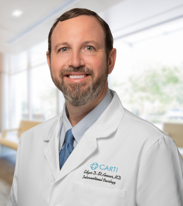 headshot of Edgar D. St. Amour, M.D.