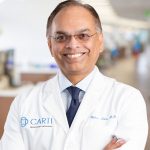 headshot of Balan Nair, M.D.