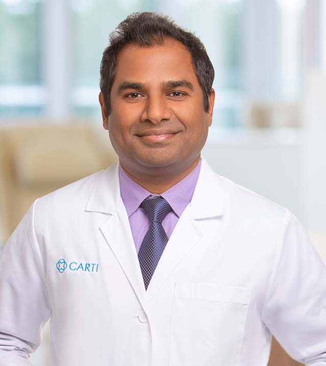 headshot of Naveen Yarlagadda, M.D., M.S., FACP